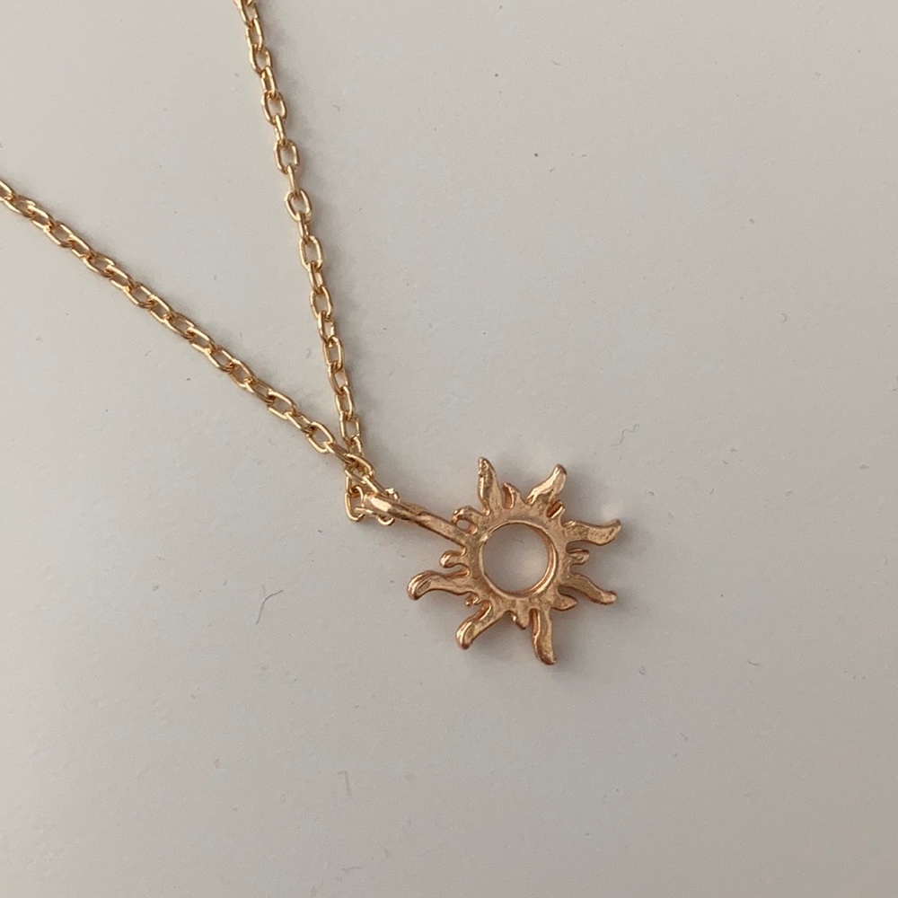 GOLD SUN PENDANT NECKLACE